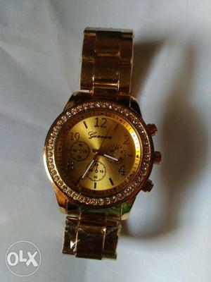 Round Gold Case Chronograph Watch With Gold Bracelet