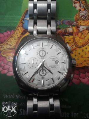 Round Stainless Steel And White Tissot Chronograph Watch