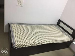 Single wodden box bed with head rest and mattress