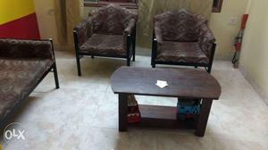Three seater sofa with two one seater chairs and
