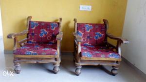 Two Red-and-blue Padded Wooden Armchairs