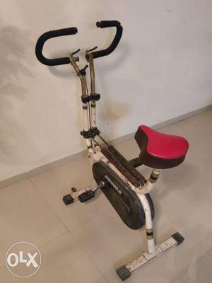 Upright exercise bike in a working condition.