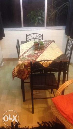 4 seater wrought iron dining table in good