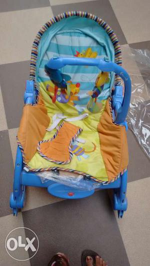 Baby rocker with hanging toys with vibrations n
