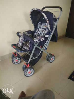 Baby's Blue And White Pram and Stroller