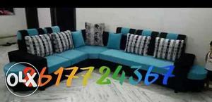 Blue Padded Corner Sofa And Throw Pillows