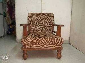 Brown Wooden Framed White And Black Zebra Armchair