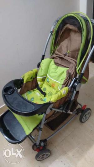 Green colour baby pram in good condition. it has