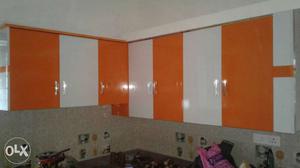 Orange And White Wooden Kitchen Cupboards