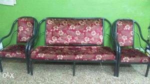 Three Pieces Pink And White Floral Padded Black Metal Futon