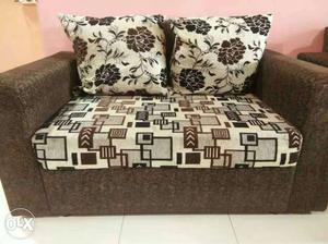 White And Brown Padded Loveseat