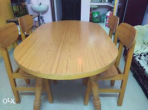 Wooden Dining Table with four chairs for sale