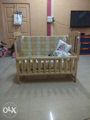 Brown Wooden Convertible Crib