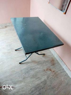 Foldable table made of iron