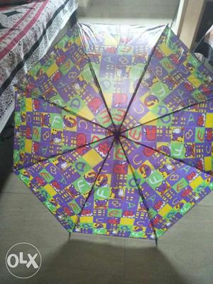 Green, Red, And Yellow Printed Umbrella
