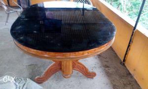 Oval Brown And Black Wooden Base Dining Bale