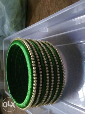 Pair Of Green Knitted Bangles
