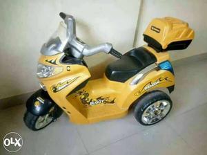 Toddler's Yellow, Black, And Grey Plastic Trike Toy