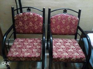 Two Black Steel Frame Armchairs
