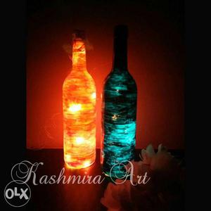Two Blue And Orange Bottle Lamps