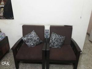 Two Sofa chairs with Center table.Just two years