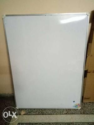White board with markers and eraser duster