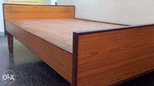 A solid pure wood heavy and strong 4 ft x 6 ft size bed