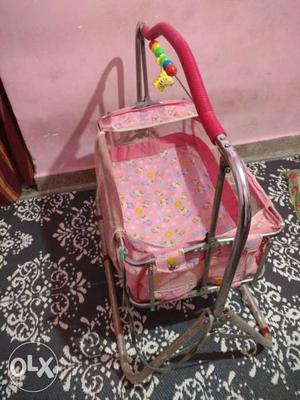 Baby's Pink Cradle With Stainless Steel Base