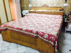 Bed with bed box and made up of teak wood. its
