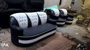 Black And White Leather Tufted Sofa