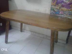 Brown Wooden Table and four chairs