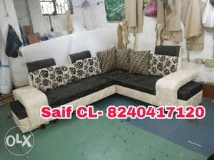 Cream and brown L shaped sofa