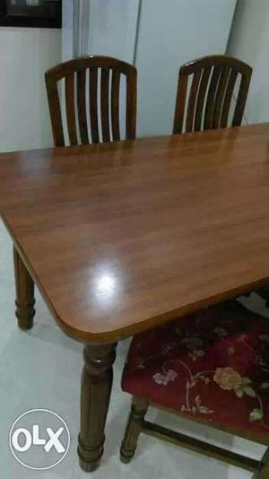 Dining Table with 4 cushion chairs. Solid Wood.