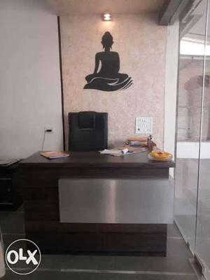 Front desk 'L' shape table with revolving chair