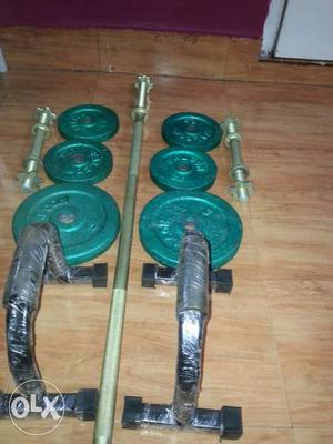 Iron plates weight 20 kg one 3 feet rod &2 small