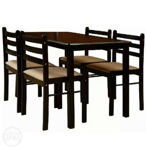 Just 2 year old 4 seater dining set with Solid wood table.