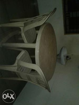 Plastic dining table with 4 chairs good