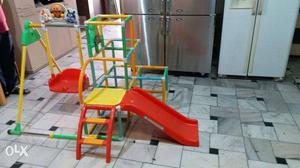 Toddler's Red, Yellow, And Green Metal Swing And Slide Play