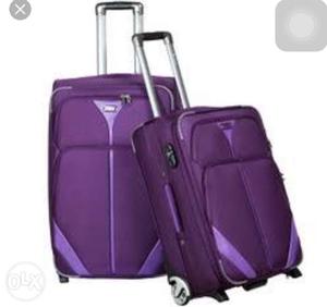 Two Purple Trolley Bags