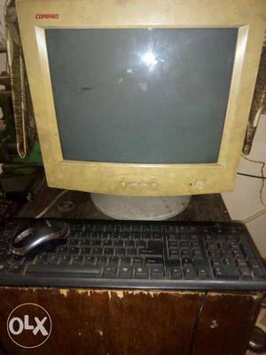 Beige CRT Computer Monitor With Keyboard And Mouse