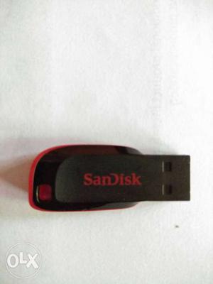 Black And Red Sandisk USB Thumb Drive