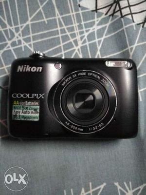 Black Nikon Coolpix Point-and-shoot Camera
