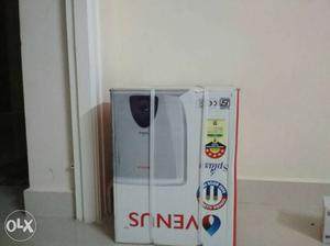 New unpacked Venus water heater with purchase