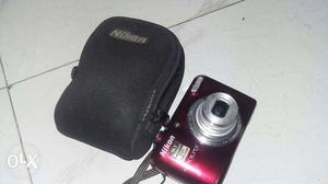 Red Nikon Digital Camera With Camera Bag bt small fault msg