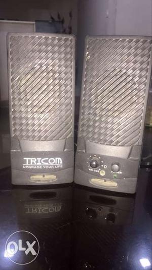 Two Black Tricom Speakers