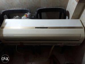 White And Brown Split Type AC Unit
