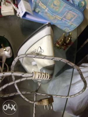 White And Gray Clothes Iron