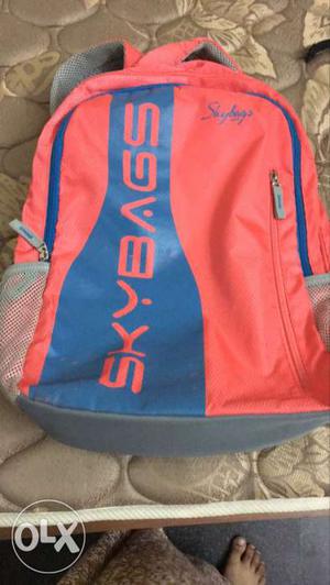 A very bright coloured bag spacious fairly use