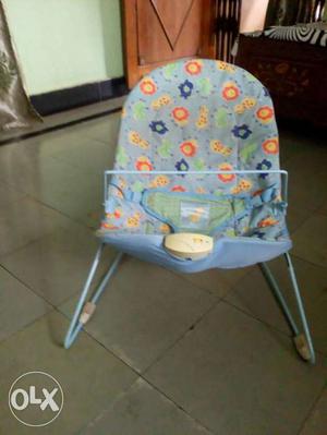 Baby's Blue And Yellow Floral Bouncer