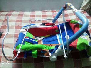Baby's Blue Green And Red Bouncer